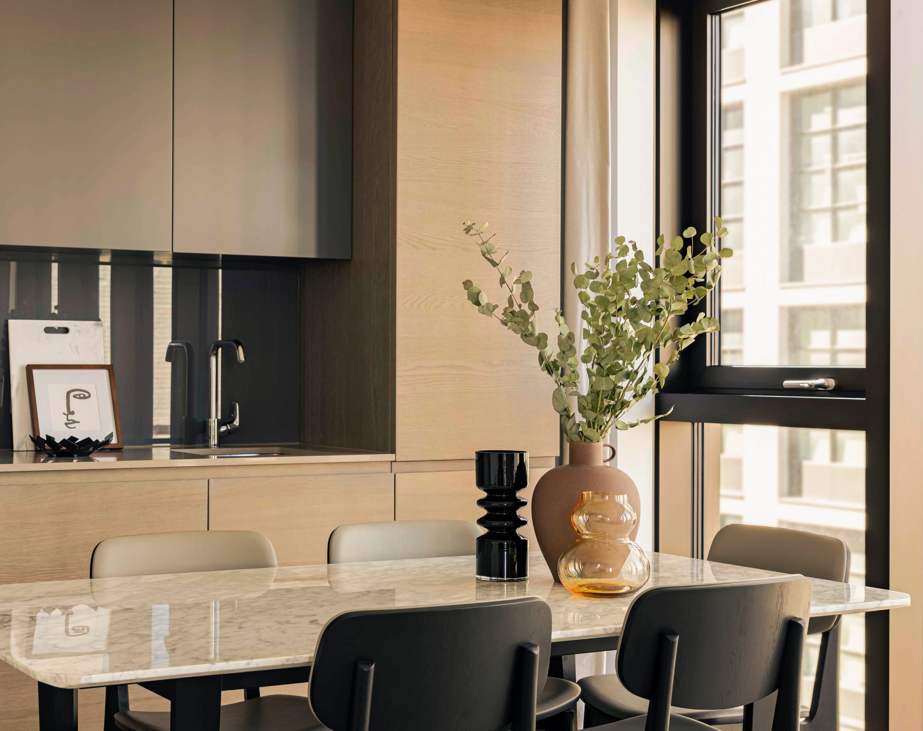 Kitchen table with flowers in three bedroom apartment in 10 george street
