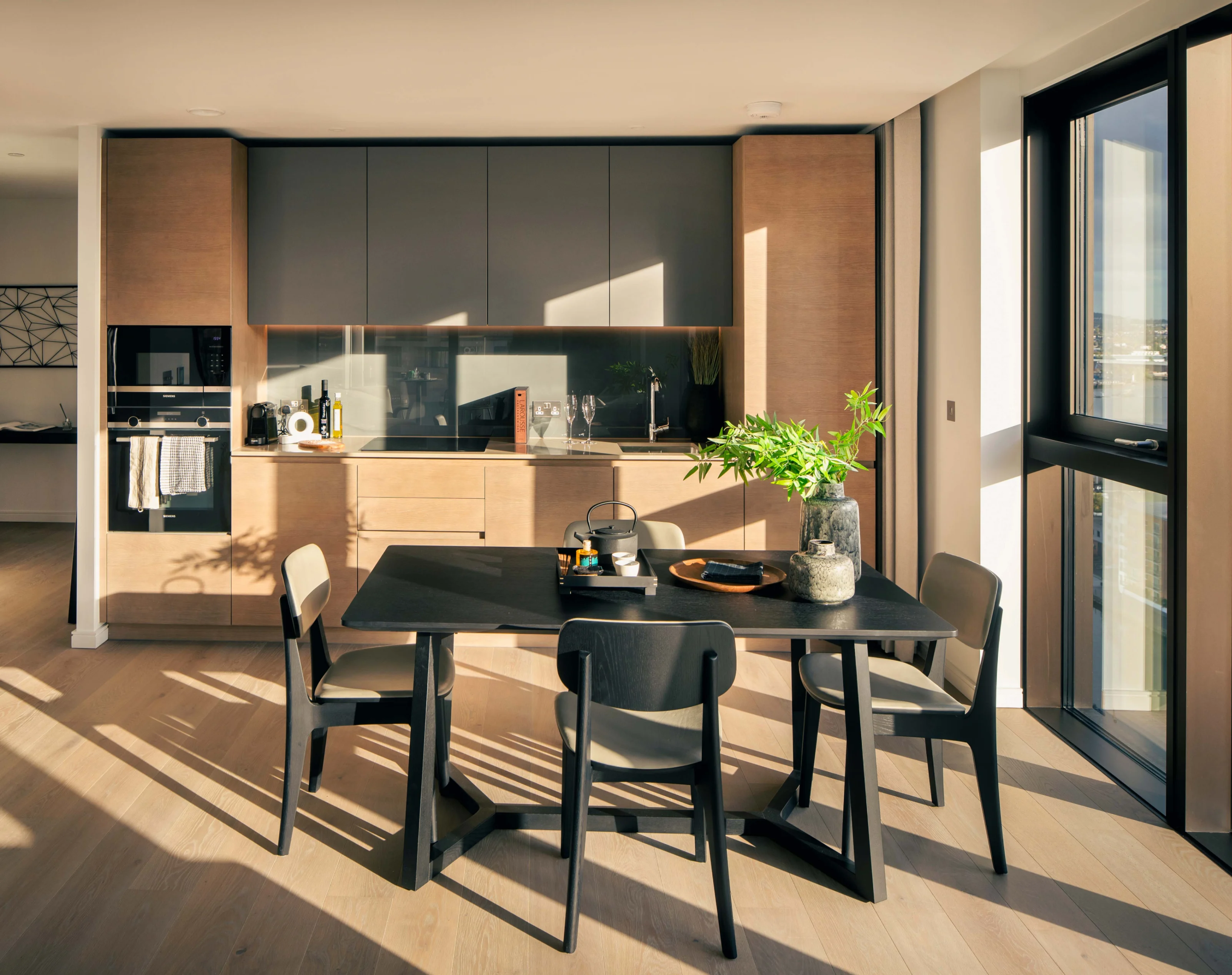 Kitchen with table in two bedroom apartment in 10 george street