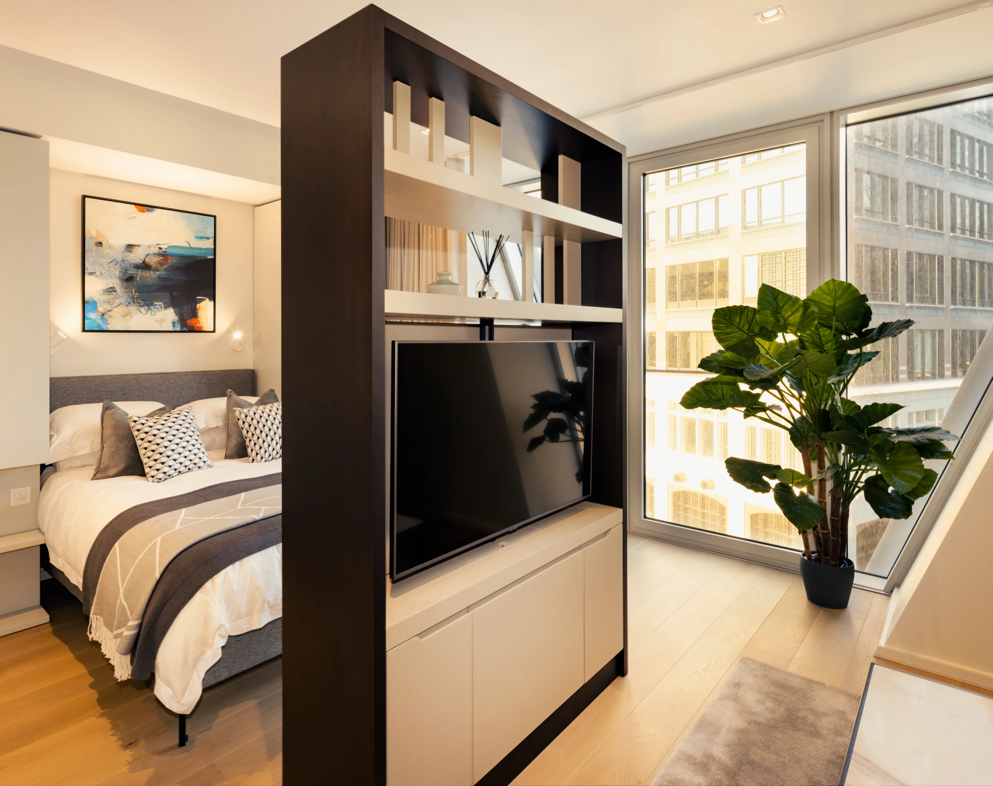 bedroom with tv in studio apartment in newfoundland