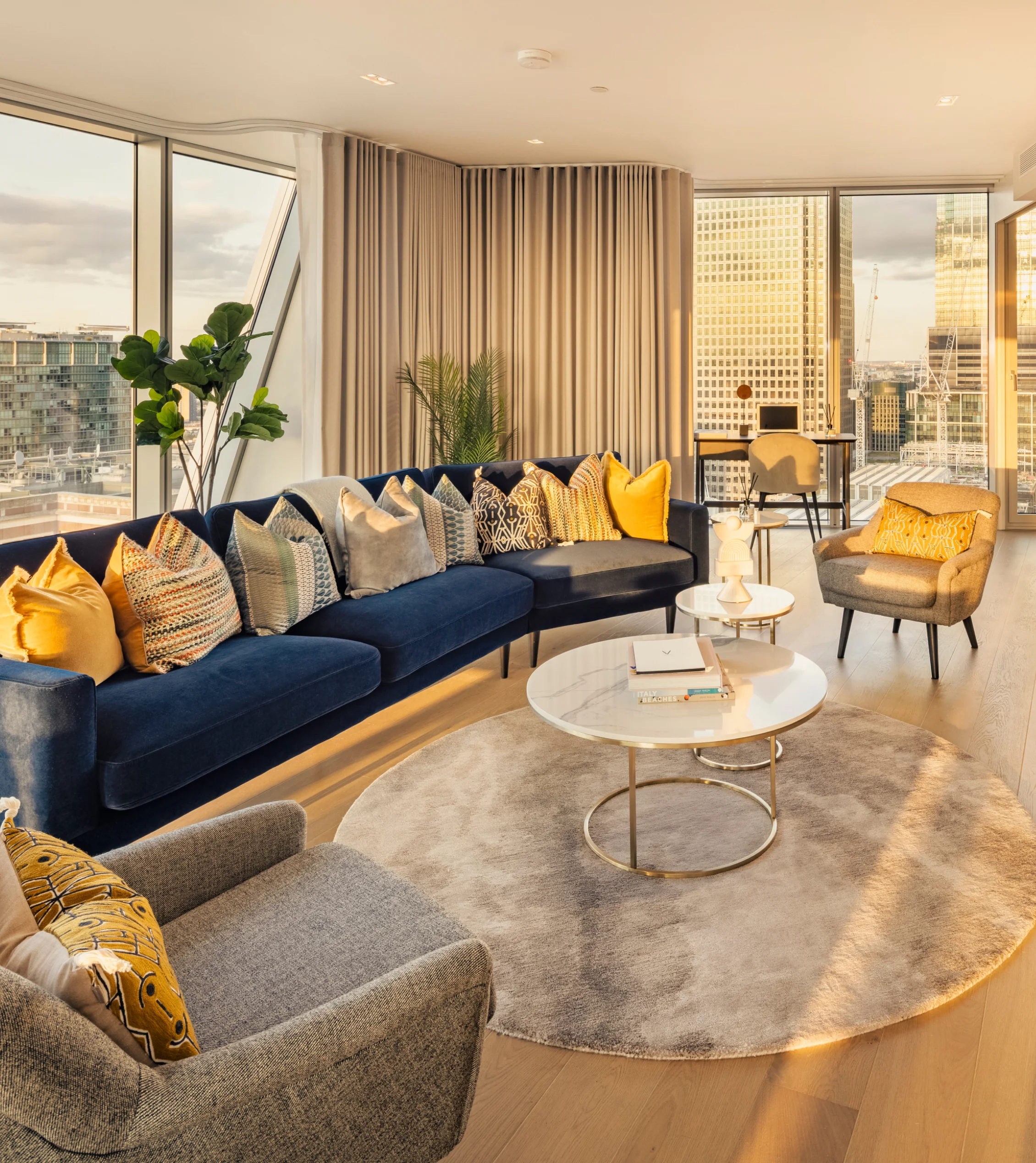 living room area with big windows in three bedroom apartment in newfoundland