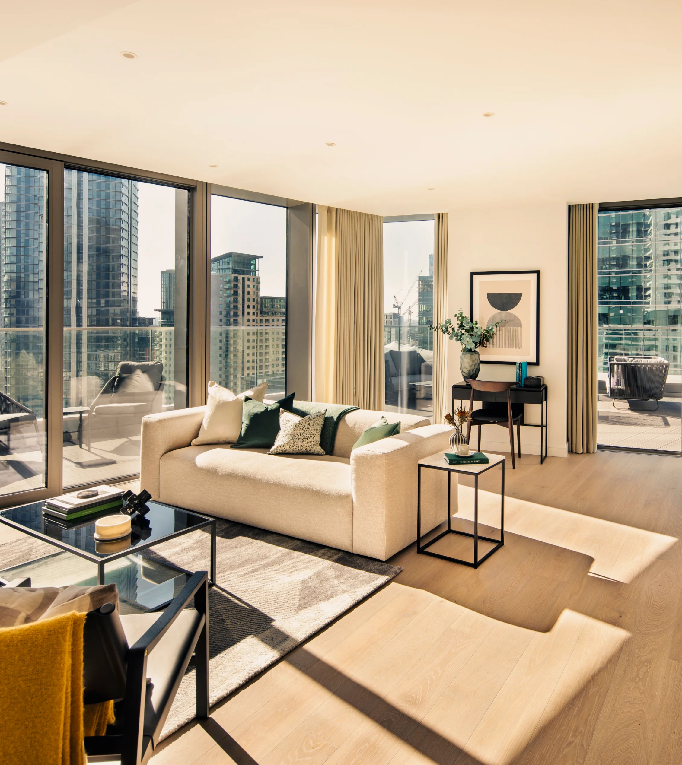 living room with comfortable sofa and big windows in 8 water street