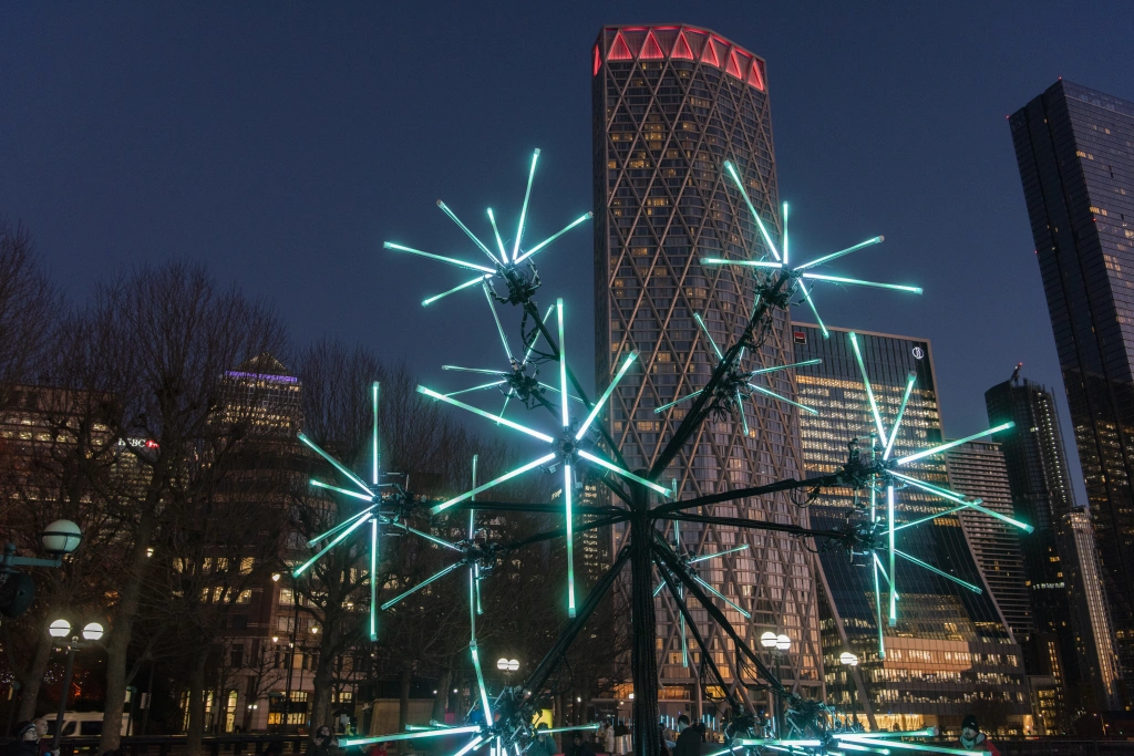 Christmas lights in Canary Wharf with Newfoundland in the background