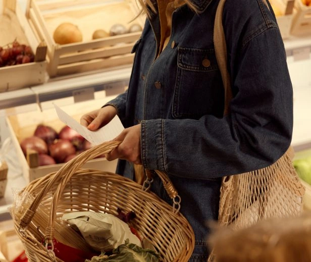 lady shopping in market with basket